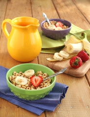 Cereal with milk, strawberry and banana