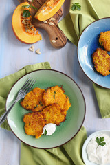 Pumpkin fritters with yogurt sauce