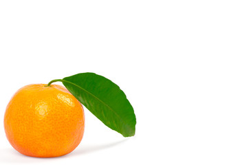 Tangerine with green leaves isolated on white