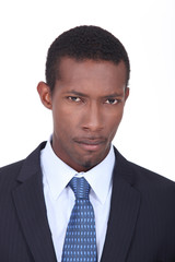 A black man in a suit.