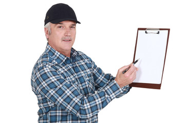 Man holding clip-board and pen