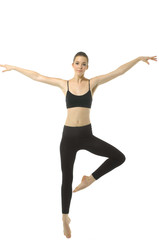 Young woman doing yoga exercise