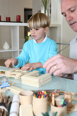 Fototapeta premium grandfather playing with his grandson