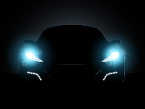 The car in the dark with the included headlights.