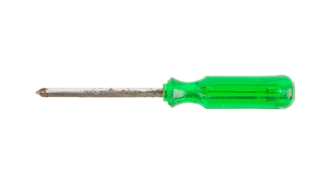Old rusted green screwdriver isolated