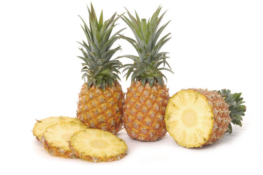 Set of fresh ripe pineapples close up