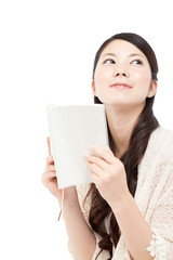 Beautiful young woman reading a book. Portrait of asian.