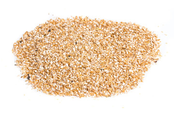Pearl barley heap isolated on white