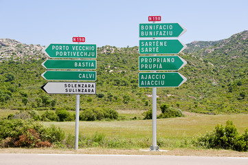 Directional signs to main cities in Corsica, France