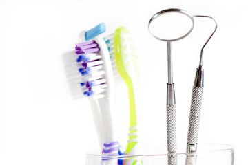 Toothbrush and Dental mirror - explorer in glass