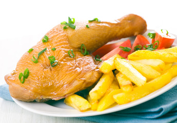 chicken leg with potato and tomato