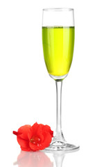 glass with cocktail and gladiolus bud isolated on white