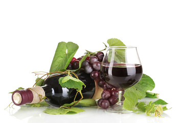 bottle of wine with grape leaves isolated on white