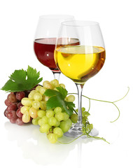 glasses of wine and ripe grapes isolated on white