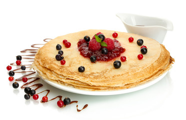 Delicious pancakes with berries and jam