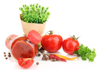 Still life tomatoes ketchup and herbs isolated on white