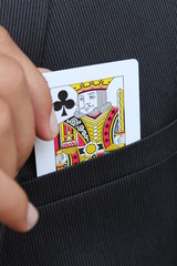 Pulling the King Card of the pocket