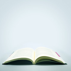 Open Book in a Grey Background