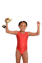 Young girl with gymnastics trophy