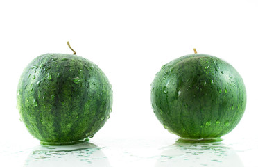 Two small watermelons in water