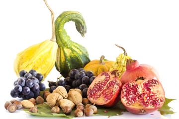 autumnal food composition with juicy pomegranate