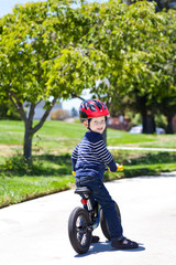 Fototapeta premium toddler on a balance bike