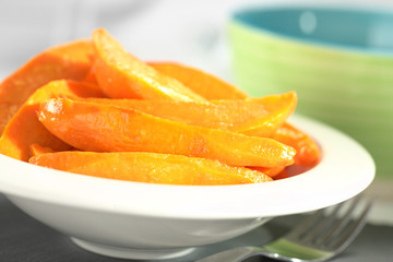 Fresh homemade caramelized sweet potato wedges