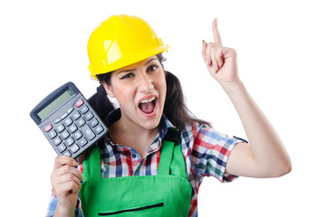 Woman builder with calculator on white