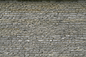 Wall from a granite brick