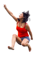 Fototapeta na wymiar Brunette jumping on trampoline over white background