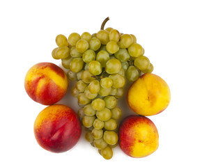 ripe peach with grapes