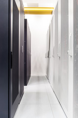 Row of network servers in datacenter room