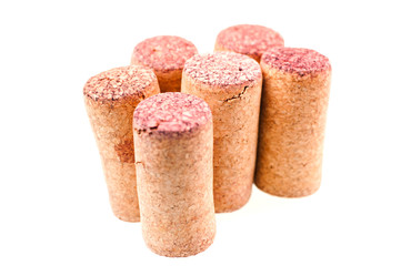 Six wine corks standing close up
