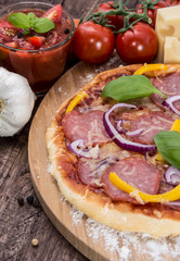 Pizza topped with Salami