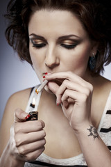 Obraz premium Lighting marijuana joint