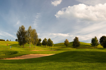 Sand bunkers on the golf course at sunset, Prague