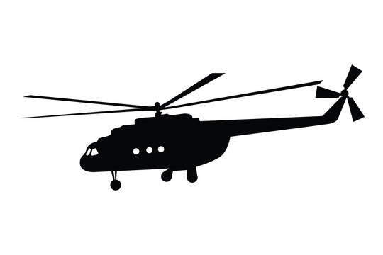 Silhouette of a helicopter in flight
