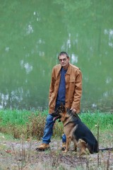 Man and German Shepherd dog