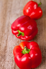 three red bell peppers