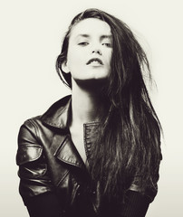Beautiful woman portrait in rock style
