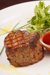 Grilled steak with sauce