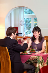 Happy Couple Enjoy Romantic Dinner