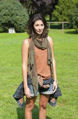 beautiful girl with scarf on the lawn