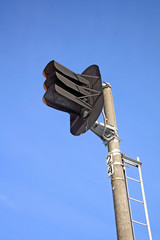 railway semaphore on blue background