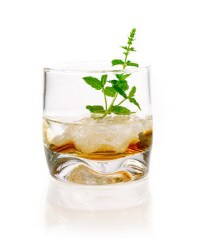 Alcoholic Drink with mint and ice cubes