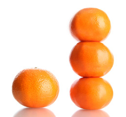 ripe tangerines isolated on white