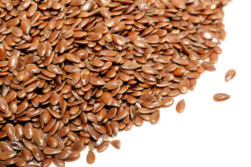 Brown Flax Seeds on White Background