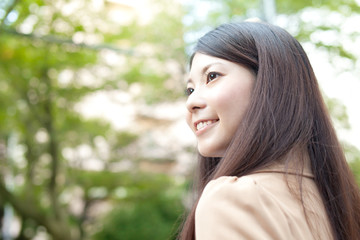 Fototapeta premium Beautiful business woman in the town
