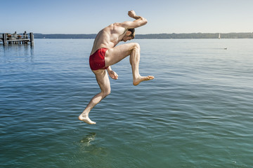 jumping into the water