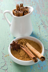 Cinnamon and anise on the vintage wooden surface